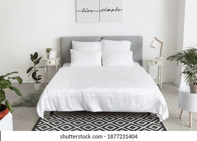 Big Comfortable Bed With Clean Linen In Room