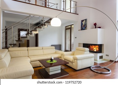 Big And Comfortable Living Room With Bright Sofa