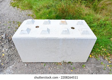 big concrete lego blocks to stop traffic - Shutterstock ID 2208264511