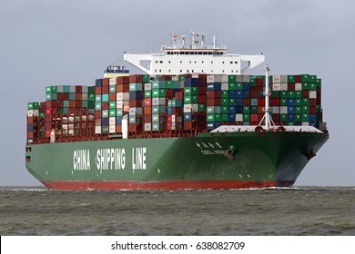 The big container ship CSCL Venus passes on 13.04.2017 the port of Cuxhaven on the Elbe.
