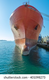 Big Container Ship On The Dock. Close-up Shot Of The Front Part.