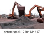 Big Crane unloading iron ore from the barges, Iron ore imported from Australia to India.