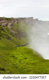 A Big Crowd In Front Of The Gulfoss Waterfall In Haukadalur, Iceland