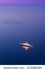 Big Cruise Ship Alone In The Sea. Night Scene