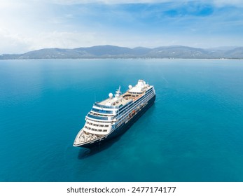 Big cruise ship in the sea at sunset. Beautiful seascape. Luxury Cruise Ship - Ocean Liner. Concept for vacation and travel with a generic cruise ship.  - Powered by Shutterstock