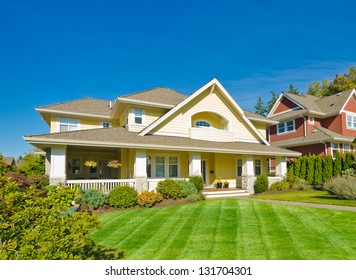 Big Custom Made Luxury House With Nicely Trimmed Front Yard In The Suburbs Of Vancouver, Canada.