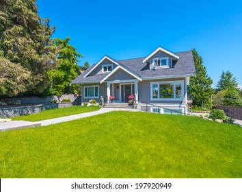 Big Custom Made Luxury House With Nicely Trimmed And Landscaped Front Yard  In The Suburb Of Vancouver, Canada.