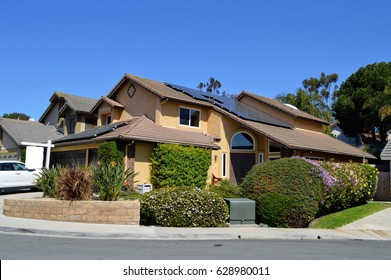   Big Custom Made Luxury House With Solar Panels On The Roof, Nicely Trimmed And Landscaped Front Yard In The Del Mar City, California.