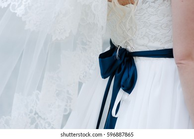 Big, Dark Blue Bow, On Bride Corsage