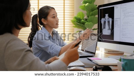 Big data AI coding screen for asian future health care smart tech IT solution. Asia team woman people code analyst job work on science project Lung X-ray scanner medtech tools meeting talk at office.