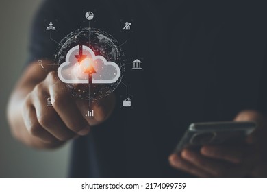 Big data analytics and business intelligence (BI) concept on a digital screen interface and a businessman working with a smartphone in the background.
