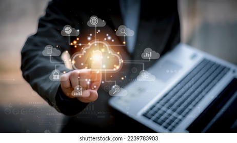 Big data analytics and business intelligence concept with chart and graph icons on a digital screen interface and a businessman in background