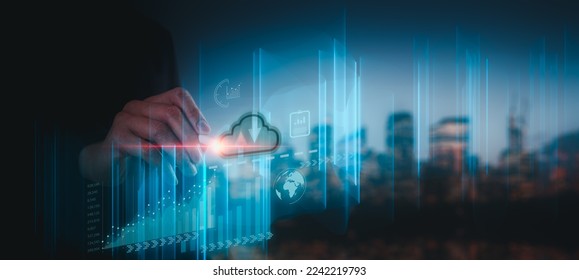 Big data analytics and business intelligence concept with chart and graph icons on a digital screen interface and a businessman in background
