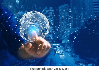 Big data analytics and business intelligence concept. Business person holding Global network connection. World map point and line composition of global business. Digital link tech. modern strategy.