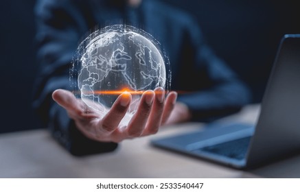 Big data analytics and business intelligence concept. Businessman holding Global network connection. World map point and line composition concept of global business.Digital link tech.