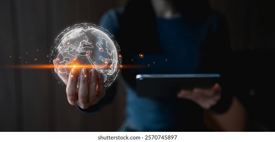Big data analytics and business intelligence concept. Businessman holding Global network connection. World map point and line composition concept of global business.Digital link tech. 