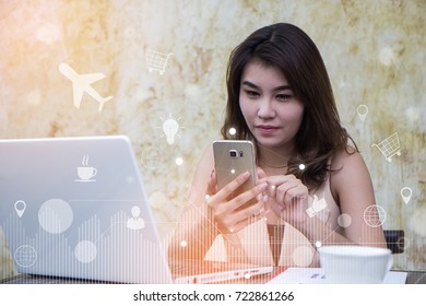 Big data analytics and business intelligence (BI) concept. Business woman hold smart phone and Pressing Virtual icons on a digital screen interface background. Technology 4.0.