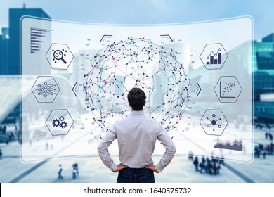Big data analytics visualization technology with scientist analyzing information structure on screen with machine learning to extract strategical prediction for business, finance, internet of things
