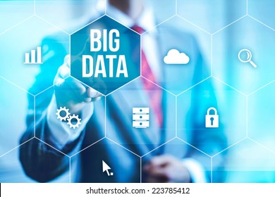 Big data concept man selecting and pressing Big Data symbol - Shutterstock ID 223785412