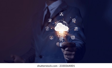 Big Data, Digital Network of Insights, businessman holding light bulb Demonstrate the power of technology to capture and analyze data. and business intelligence shapes the future of global markets.