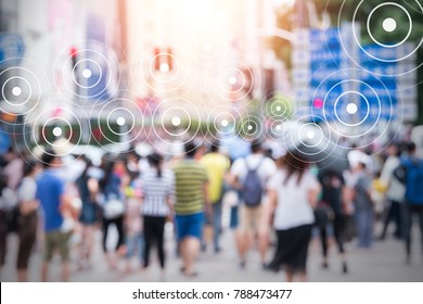 Big data , Iot , Internet of things every where , beacon and smart city technology concept. Neural networks connect signal graphic and blur group of people in metropolis.