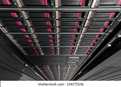 Big data serer in rack with multiple hard drives.
