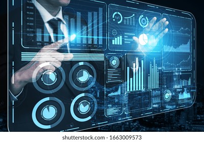 Big Data Technology for Business Finance Analytic Concept. Modern graphic interface shows massive information of business sale report, profit chart and stock market trends analysis on screen monitor.