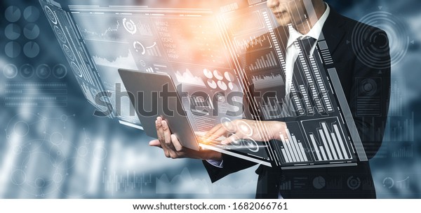 Big Data Technology for Business Finance\
Analytic Concept. Modern graphic interface shows massive\
information of business sale report, profit chart and stock market\
trends analysis on screen\
monitor.