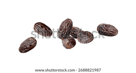Big dates falling isolated. Dry date flying fruits, medjool explosion, medjoul or majhool, royal dates on white background