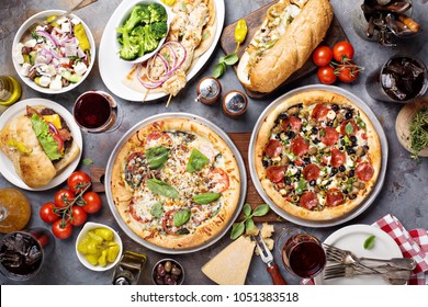 Big Dinner With Pizza, Salad And Sandwiches Overhead View