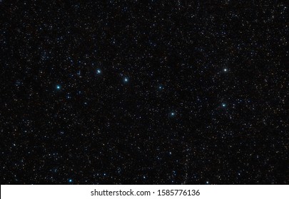 The Big Dipper in the constellation of Ursa Major in the sky full of stars