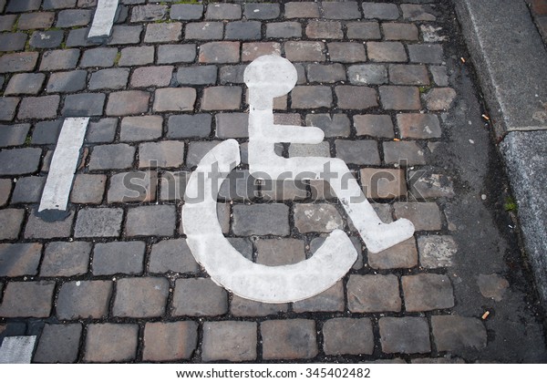 Big disabled parking\
sign