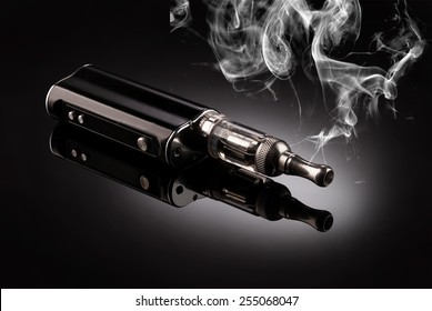big electronic cigarettes isolated on black