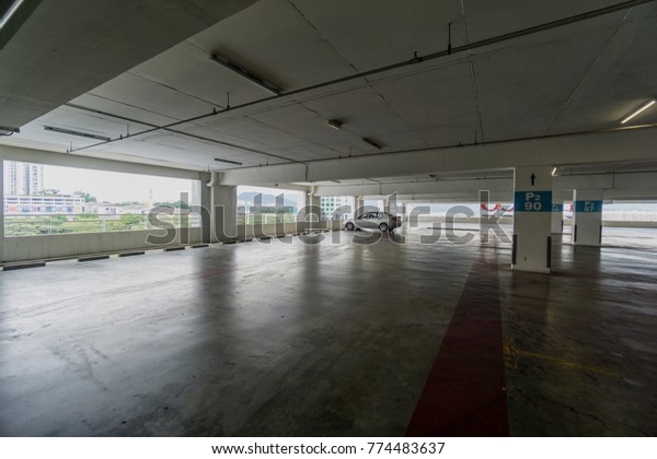 Big empty indoor parking\
area