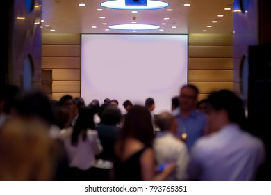 Big Empty Screen Over People In Meeting Room