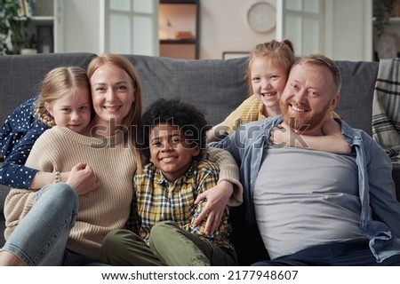 Big family with adopted children at home