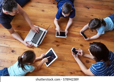 big family with gadgets - Powered by Shutterstock