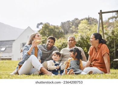 Big family, grandparents and children for picnic, relax and bubbles on grass or garden outdoor in summer. Love, people and kids in backyard of home for care, freedom and bonding in nature or park - Powered by Shutterstock