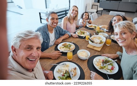 Big family, lunch and selfie with food on table in home dining room. Fine dining, happy memory and grandma, grandpa and father, mother and girls with healthy meal taking pictures for social media. - Powered by Shutterstock