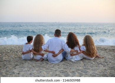 Big Family On Vocation. Happy Family Sitting Sea. Famaly, Travel, Tour Concept.