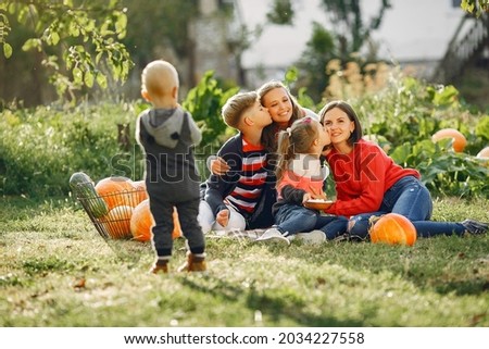 Similar – Image, Stock Photo Boy taking photo to family with apples in basket