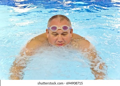 Big Fat Man In The Swimming Pool Playing Sports