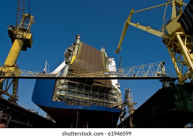 Big ferryboat in a dock during repairs. - Powered by Shutterstock