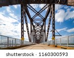 The Big Four Bridge that connects Kentucky and Indiana is an old railroad truss bridge, originally built in 1895, and was converted into a path for people to walk, run and bike across the Ohio River.