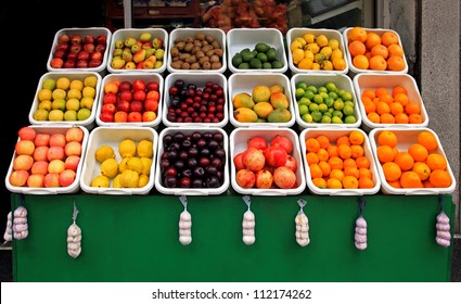 Big Fruit Stand In Front Of Grocery Store