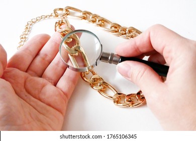 big golden chain on white background, pawnshop concept, jewerly shop concept