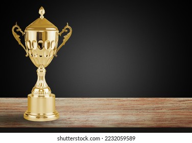 Big golden Cup Trophy on the desk