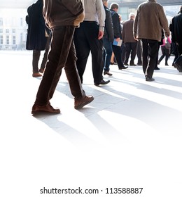 The Big Group Of Older Persons. People Walking Against A Light Background.