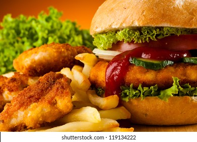 Big hamburger, chicken nuggets and French fries