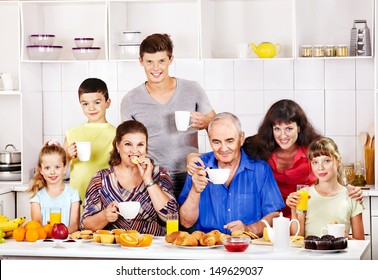 Big Happy Family Have Breakfast At Kitchen.